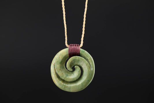 Double koru carved from flower nephrite jade Putiputi pounamu greenstone || JF1065