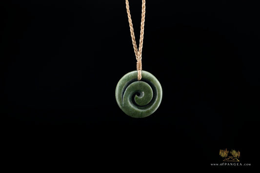 Koru spiral pendant carved from Kawakawa Pounamu Nephrite Jade || JF139